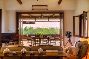 River Kwai House - Living room opening onto the river-view terrace