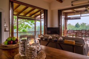 River Kwai House - Lounge with doors folding open to the terrace