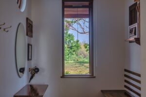 River Kwai House - Hallway window onto the garden