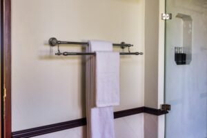 River Kwai House - Bathroom towel rail and glass shower